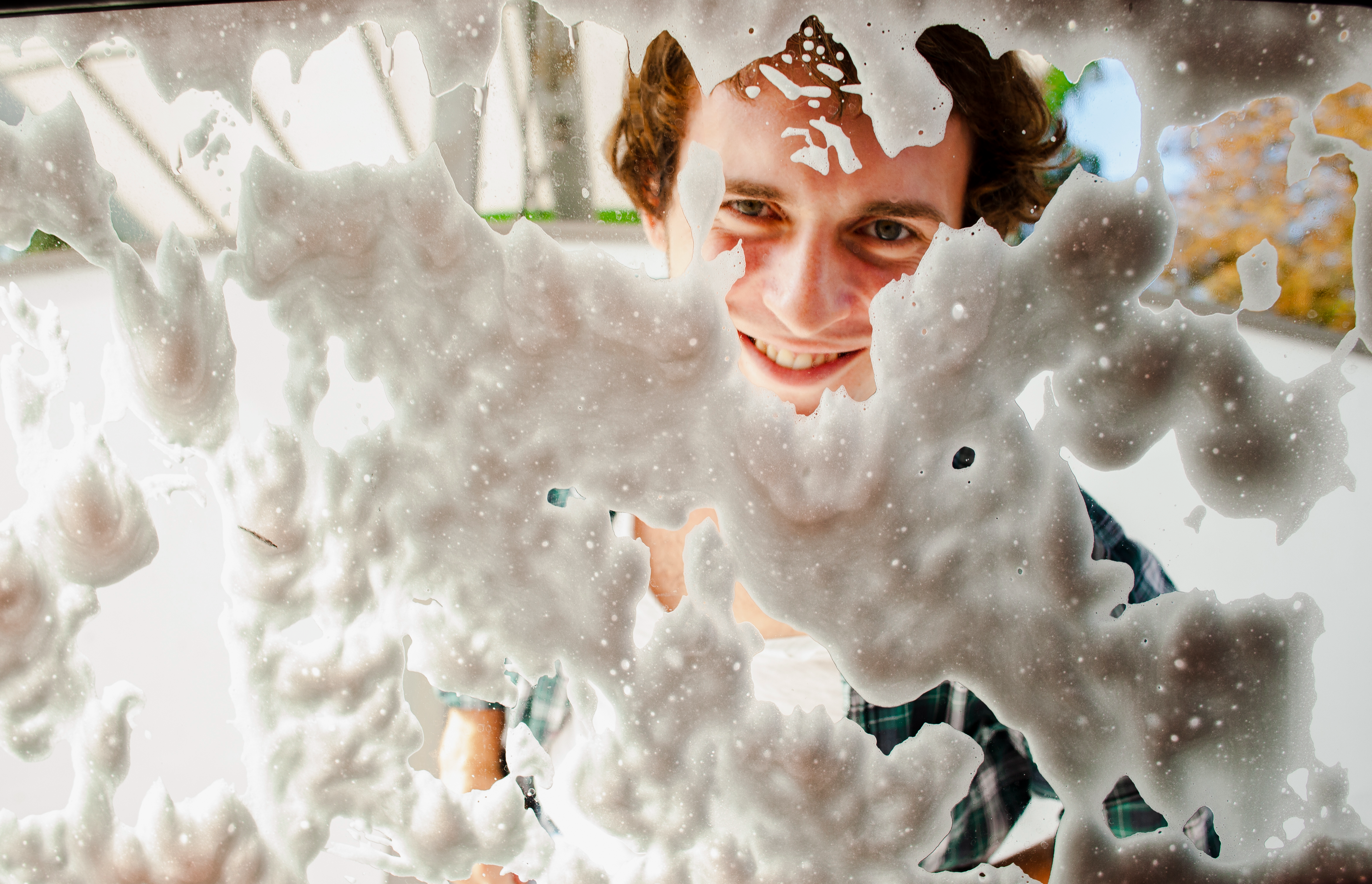 close-up-man-washing-rear-window-jpg